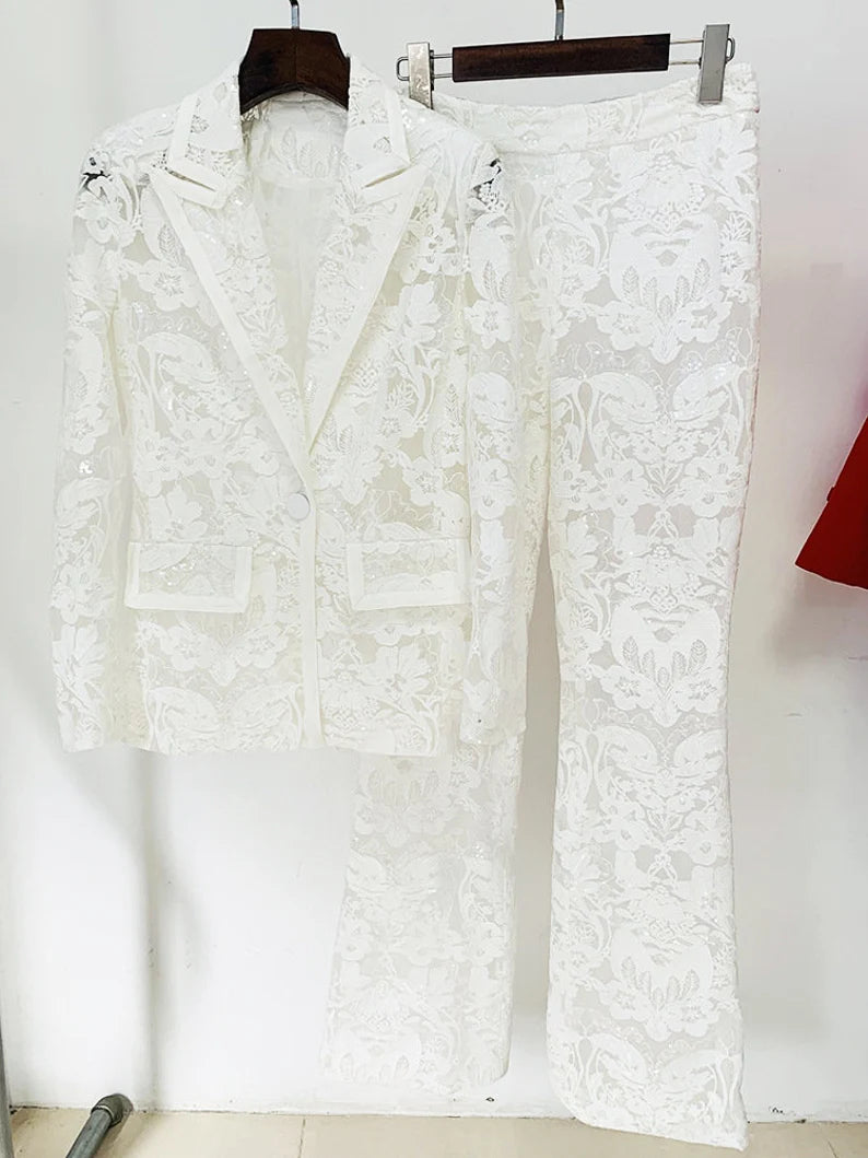 Crafted for sophistication, this ensemble is a stunning choice for weddings, ensuring you radiate grace on your special day. Elevate your birthday party look with the intricate lace details and bohemian flair of this exquisite suit. The versatile design seamlessly transitions from day to evening, making it ideal for a night out on the town. The dazzling sequins add a touch of glamour, ensuring you make a statement at any event.