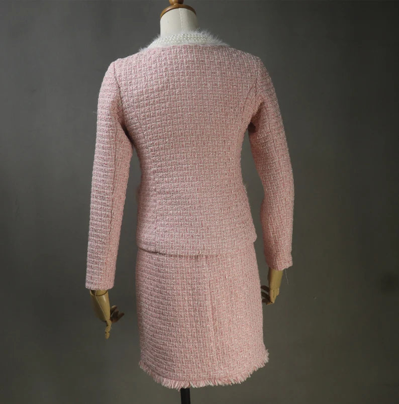 A pink fluffy coat designed for winter not only adds a pop of color to your wardrobe but also offers exceptional warmth and comfort. The fluffy texture not only looks stylish but also provides insulation against the chilly weather. With the option to customize the coat's design, you can choose a style that suits your personality, whether it's a sleek and tailored silhouette or a more relaxed and cozy fit