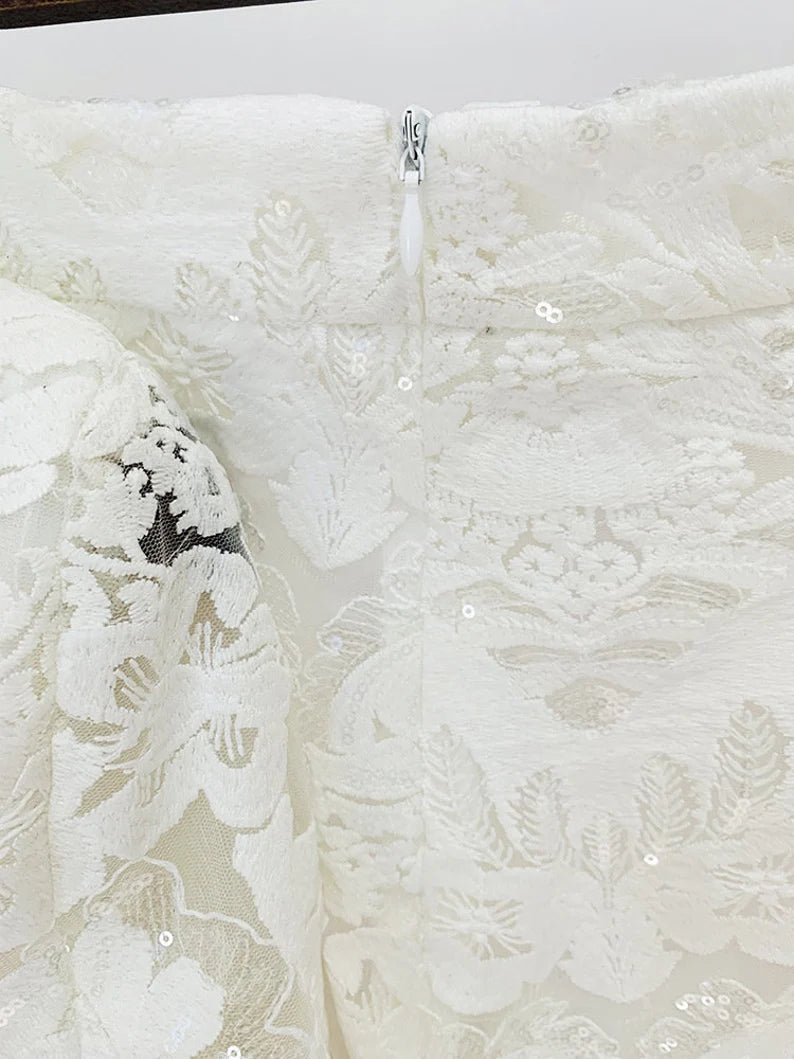 Crafted for sophistication, this ensemble is a stunning choice for weddings, ensuring you radiate grace on your special day. Elevate your birthday party look with the intricate lace details and bohemian flair of this exquisite suit. The versatile design seamlessly transitions from day to evening, making it ideal for a night out on the town. The dazzling sequins add a touch of glamour, ensuring you make a statement at any event.