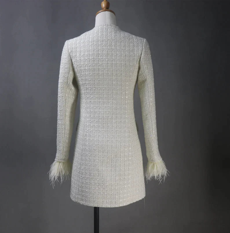 Tailor-made tweed women's clothing with pearl button designs offers a blend of traditional craftsmanship, personalization, and timeless elegance. It's a fashion choice that celebrates individuality and attention to detail, resulting in clothing that is both stylish and comfortable.