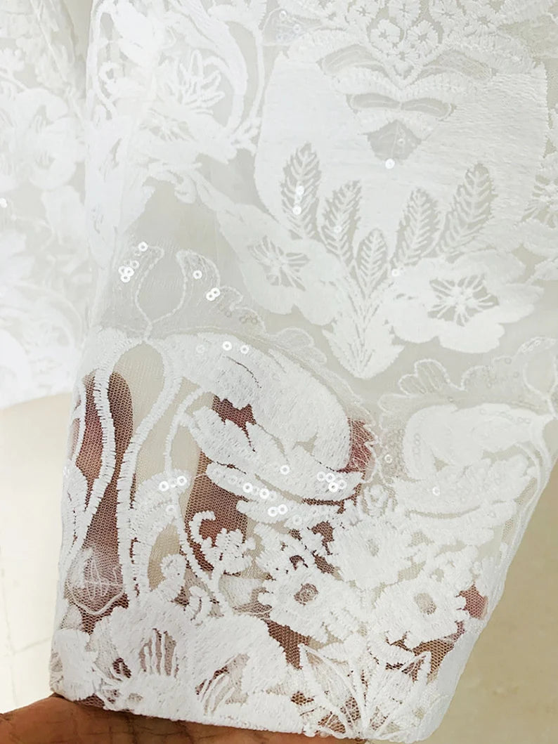 Crafted for sophistication, this ensemble is a stunning choice for weddings, ensuring you radiate grace on your special day. Elevate your birthday party look with the intricate lace details and bohemian flair of this exquisite suit. The versatile design seamlessly transitions from day to evening, making it ideal for a night out on the town. The dazzling sequins add a touch of glamour, ensuring you make a statement at any event.