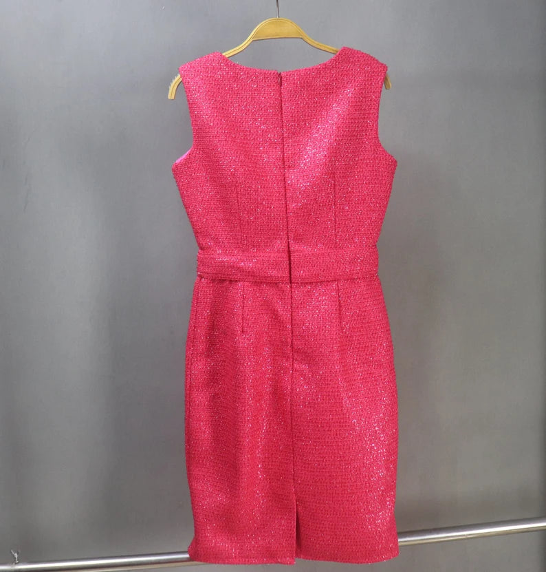 It's not just a dress; it's an expression of your personality. Elevate your fashion game with a red tweed dress that's tailored to perfection, enhancing your natural beauty and embracing your individuality. Our red tweed dress with custom tailoring ensures you are the star of every gathering. Embrace the fusion of tradition and contemporary fashion with our red sheath dress.
