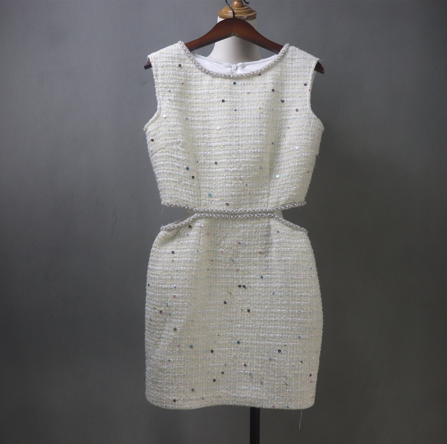 Step into elegance with this custom-made light beige dress, featuring a stunning pearl-trimmed neckline, multi-color sequin embellishments, and a chic cut-out waist. Designed for weddings, formal events, and parties, this dress offers a luxurious, tailored fit in both petite and plus sizes. Choose from mini, midi, or maxi skirt lengths to match your personal style!