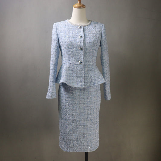 Gray textured suit on a mannequin against a gray background