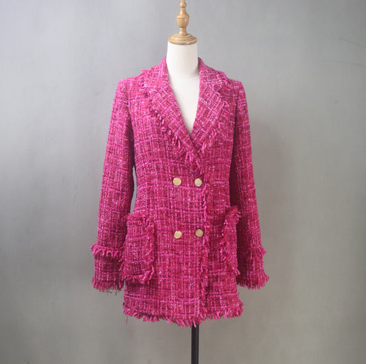 Custom-made hot pink tweed bouclé blazer jacket with double-breasted gold buttons and fringe trim on a dress form