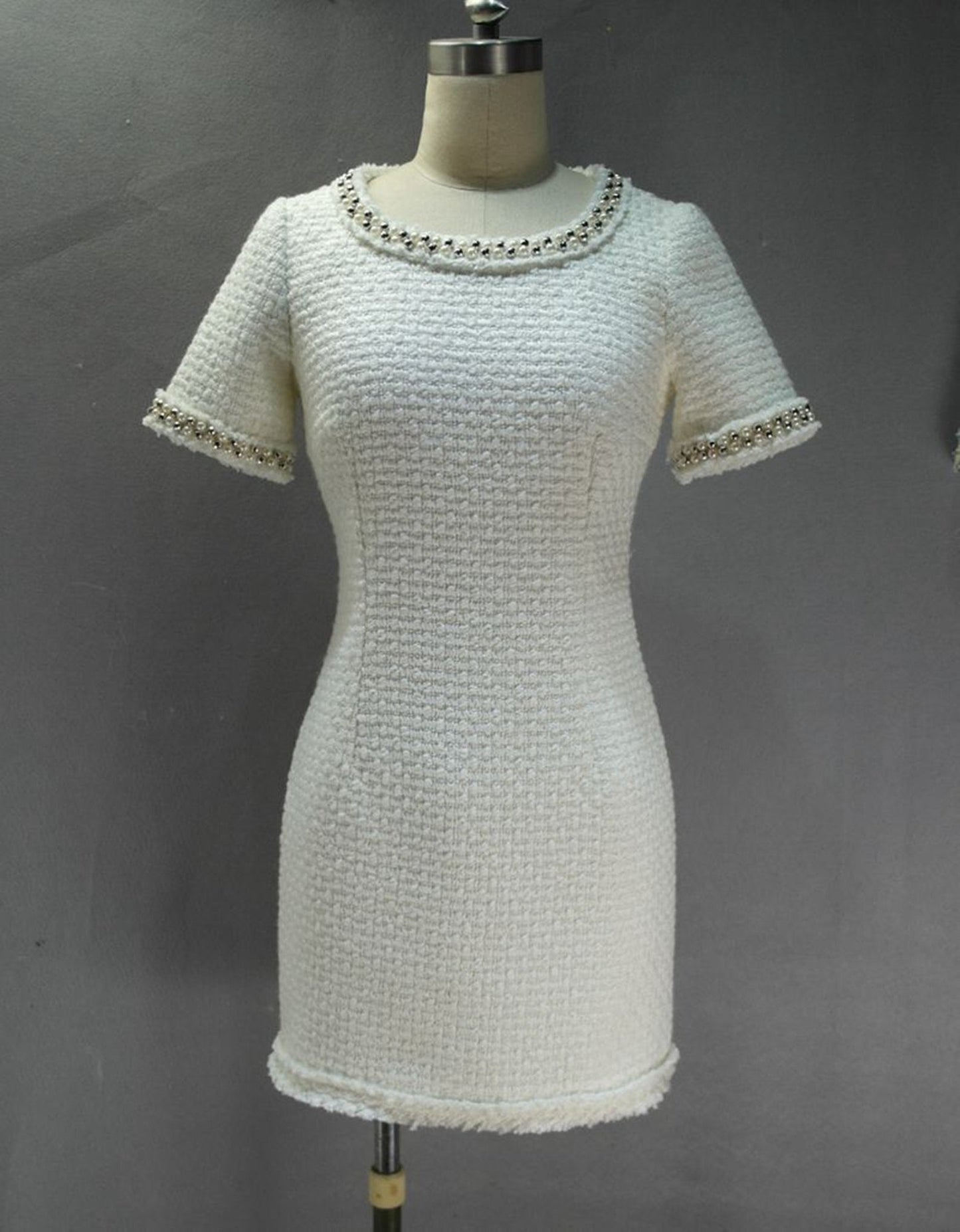 Sheath Custom Made Pearls White WOOL Tweed Dress UK CUSTOMER SERVICE! Sheath Custom Made Pearls White WOOL Tweed Dress - Round neck and arm with gold and pearl button designed. Knee Length Sheath Dress. Our tailor will make sharp body measurement and look perfect fit. You will love this casual sheath dress! It's a must-have piece in your wardrobe with its simple silhouette and slight A-line shape.