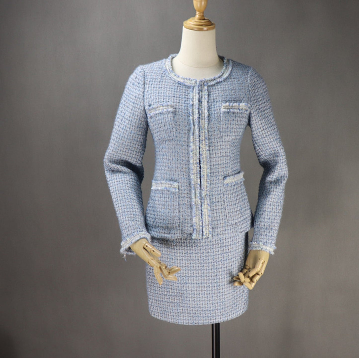 Women's Custom Made Tassel Light Blue Tweed Blazer + Skirt Suit UK CUSTOMER SERVICE! Women's Custom Made Tassel Light Blue Tweed Blazer + Skirt Suit - Custom made suit with front pocket and long sleeves, Our tailor will happy to make exact body measurement , as per customer requirement. All items are made to order. Please advise your height, weight and body measurements ( Bust, shoulder, Sleeves, Waist and Length etc). Our tailors will make the order for you! Materials: Wool blend