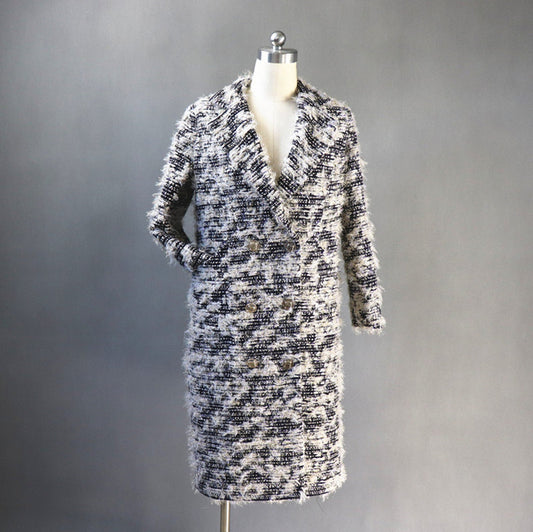 Women Designer Inspired Tweed Wool Blend Golden Threads Black Coat UK CUSTOMER SERVICE! Women Designer Inspired Tweed Wool Blend Golden Threads Black Coat - long coat with sleeve, Wool blend, fully lined and Custom made order. All items are made to order. Please advise your height, weight and body measurements ( Bust, shoulder, Sleeves, Waist and Length etc). Our tailors will make the order for you! We also need your Mobile Number for the tracking delivery. Materials: Wool Blend