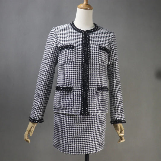 Tailor Made Houndstooth Check Pattern Jewellery Trim Tweed Jacket Coat Blazer + Shorts/Skirts/Trousers There are many different materials to pick from when purchasing one of our ladies tailored coats, including light and heavy weight tweeds. As with all of our clothing, we recognise that each person's personal landscape is unique, thus our skilled tailor's advice is essential to guaranteeing the size and figuration are ideal.