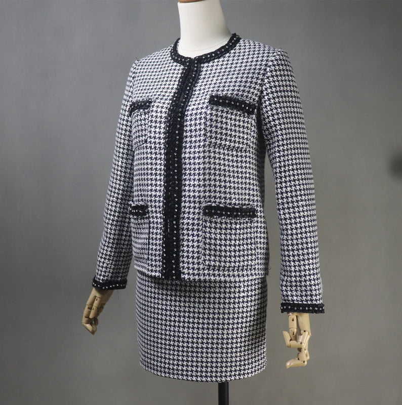 Tailor Made Houndstooth Check Pattern Jewellery Trim Tweed Jacket Coat Blazer + Shorts/Skirts/Trousers There are many different materials to pick from when purchasing one of our ladies tailored coats, including light and heavy weight tweeds. As with all of our clothing, we recognise that each person's personal landscape is unique, thus our skilled tailor's advice is essential to guaranteeing the size and figuration are ideal.