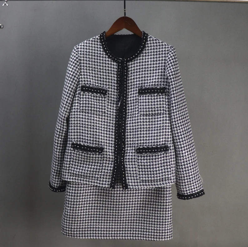 Tailor Made Houndstooth Check Pattern Jewellery Trim Tweed Jacket Coat Blazer + Shorts/Skirts/Trousers There are many different materials to pick from when purchasing one of our ladies tailored coats, including light and heavy weight tweeds. As with all of our clothing, we recognise that each person's personal landscape is unique, thus our skilled tailor's advice is essential to guaranteeing the size and figuration are ideal.