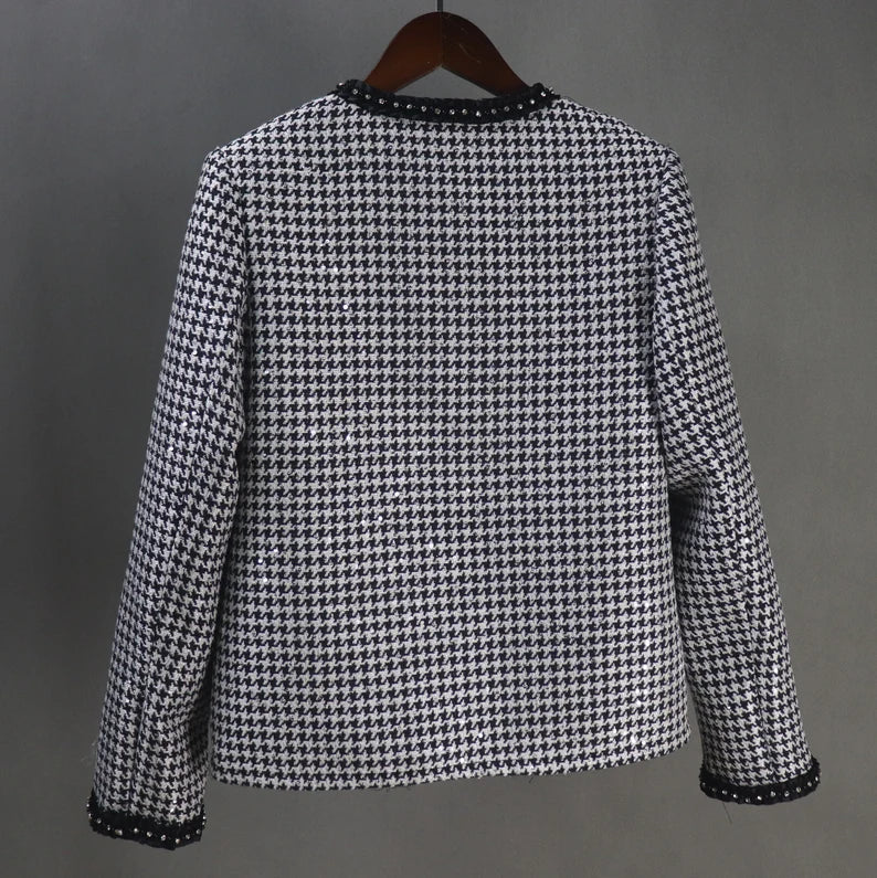 Tailor Made Houndstooth Check Pattern Jewellery Trim Tweed Jacket Coat Blazer + Shorts/Skirts/Trousers There are many different materials to pick from when purchasing one of our ladies tailored coats, including light and heavy weight tweeds. As with all of our clothing, we recognise that each person's personal landscape is unique, thus our skilled tailor's advice is essential to guaranteeing the size and figuration are ideal.