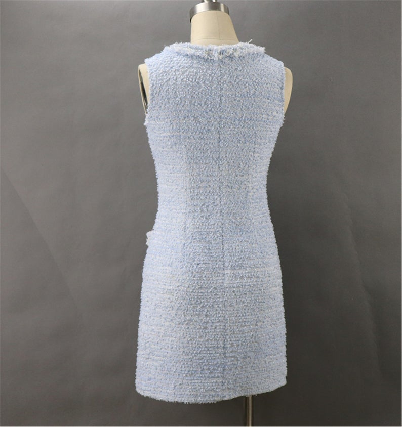 Tweed Sheath Dress Light Blue For Womens Custom Made UK CUSTOMER SERVICE! Tweed Sheath Dress Light Blue For Women's Custom Made - Round Neck with two pockets and Sleeveless. Fastening back zipper and Fringe detail. All items are made to order. Please advise your height, weight and body measurements ( Bust, shoulder, Sleeves, Waist and Length etc). Our tailors will make the order for you! Materials: Wool blend