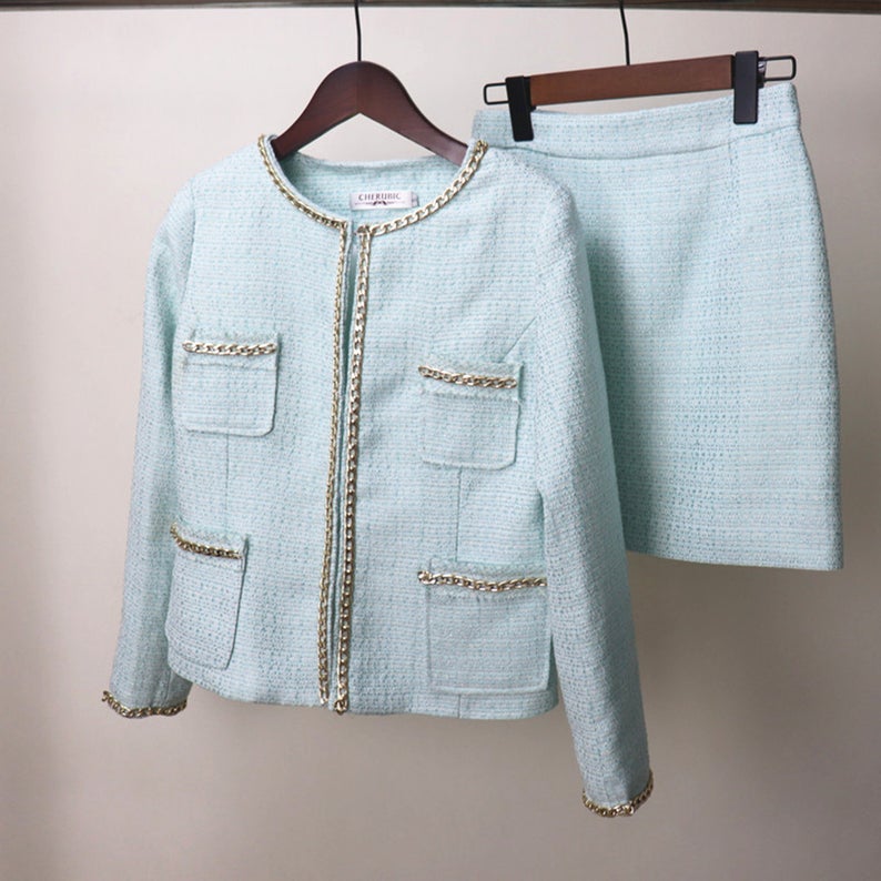 Tailor Made Suits for Women Chain Decoration Tweed Blazer + Skirt Suit - Sky Blue suit and skit with round neck and chain decorated for arm and pocket. We customize everything according to your measurements because we want to make sure your suit fits you perfectly. We create garments that are a perfect fit and deliver it to your door.