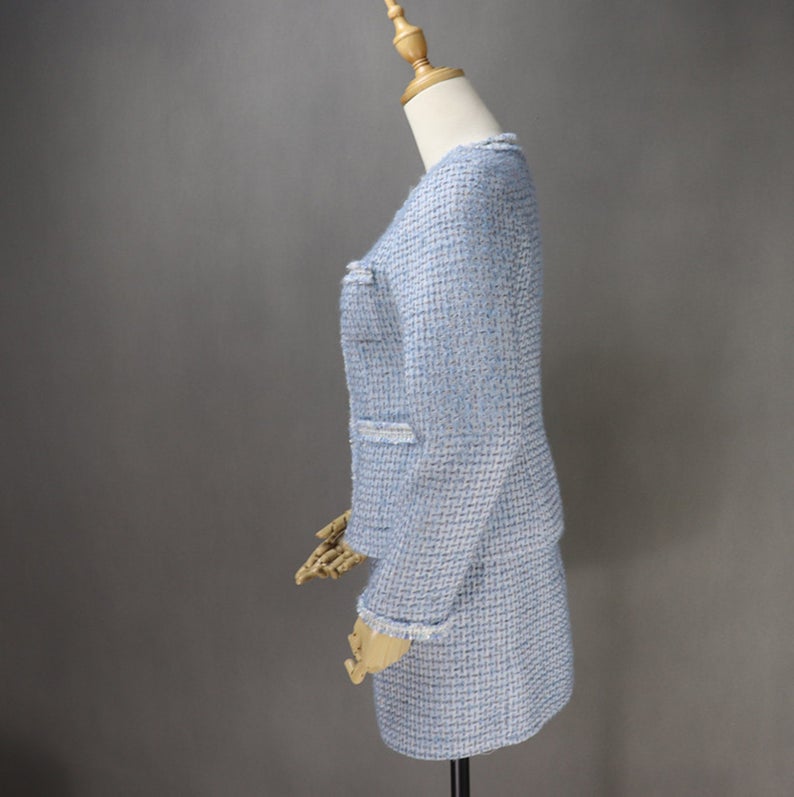 Women's Custom Made Tassel Light Blue Tweed Blazer + Skirt Suit UK CUSTOMER SERVICE! Women's Custom Made Tassel Light Blue Tweed Blazer + Skirt Suit - Custom made suit with front pocket and long sleeves, Our tailor will happy to make exact body measurement , as per customer requirement. All items are made to order. Please advise your height, weight and body measurements ( Bust, shoulder, Sleeves, Waist and Length etc). Our tailors will make the order for you! Materials: Wool blend