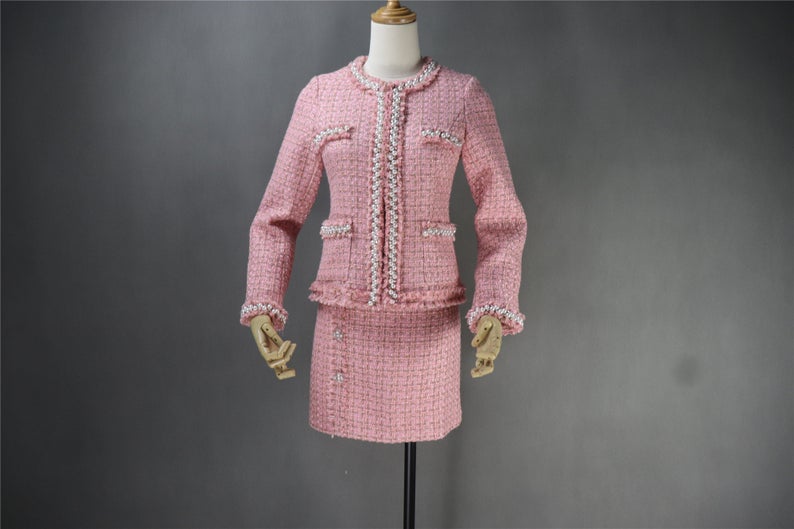 Tweed Pearls Sparkle Thread Blazer + Skirt Suit UK CUSTOMER SERVICE! Tweed Pearls Sparkle Thread Blazer + Skirt Suit - Fashion elements combine classic design. Great for teens or some young ladies dressing the classic, retro, casual and stylish look. Dress designed with pearl buttons , round neck and little tassel. This can be worn all suitable occasion. We have multi-coloured suits white top and black bottom, blue ,pink, black.