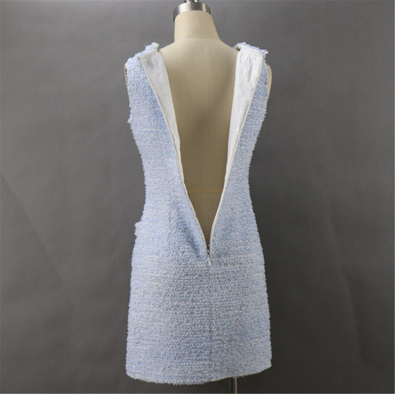 Tweed Sheath Dress Light Blue For Womens Custom Made UK CUSTOMER SERVICE! Tweed Sheath Dress Light Blue For Women's Custom Made - Round Neck with two pockets and Sleeveless. Fastening back zipper and Fringe detail. All items are made to order. Please advise your height, weight and body measurements ( Bust, shoulder, Sleeves, Waist and Length etc). Our tailors will make the order for you! Materials: Wool blend
