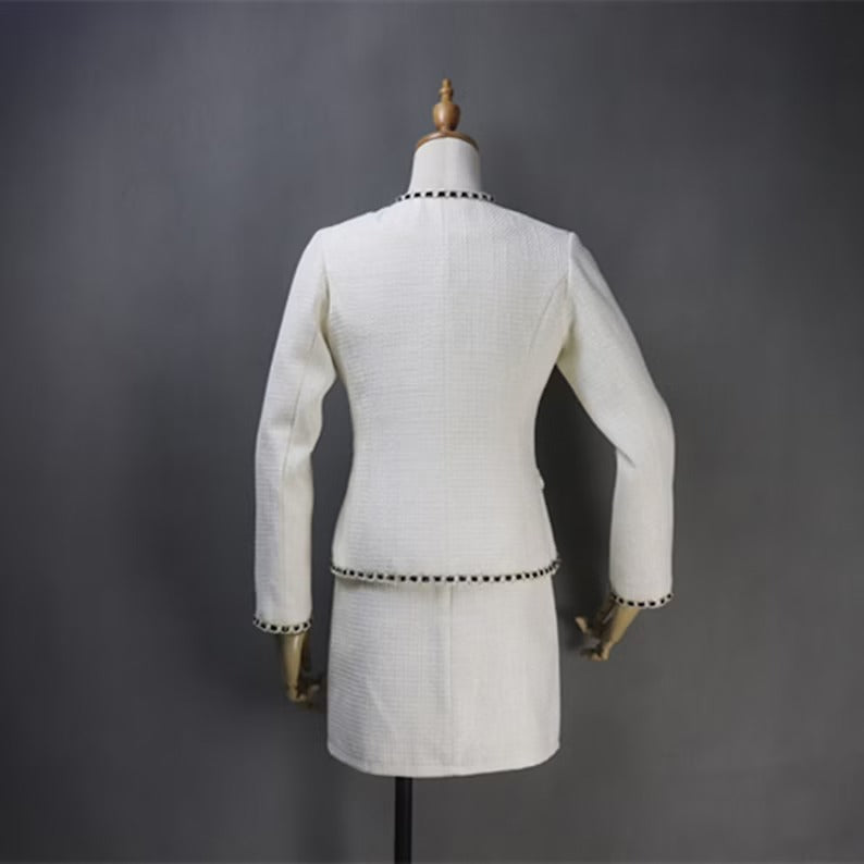 Women's White and Sparkle Trim Tweed Suit UK CUSTOMER SERVICE! Women's White and Sparkle Trim Tweed Suit - Suits and Coat have unique style. We offer Shorts, Skirts, Trousers for the suit. Our tailor will make as per customer requirement like with pocket, sleeveless, without pocket etc. All items are made to order with very experienced tailors. Please advise your height, weight and body measurements