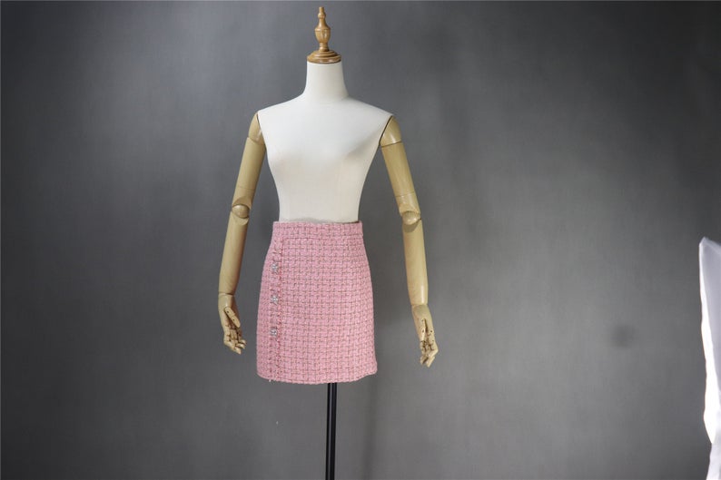 Tweed Pearls Sparkle Thread Blazer + Skirt Suit UK CUSTOMER SERVICE! Tweed Pearls Sparkle Thread Blazer + Skirt Suit - Fashion elements combine classic design. Great for teens or some young ladies dressing the classic, retro, casual and stylish look. Dress designed with pearl buttons , round neck and little tassel. This can be worn all suitable occasion. We have multi-coloured suits white top and black bottom, blue ,pink, black.