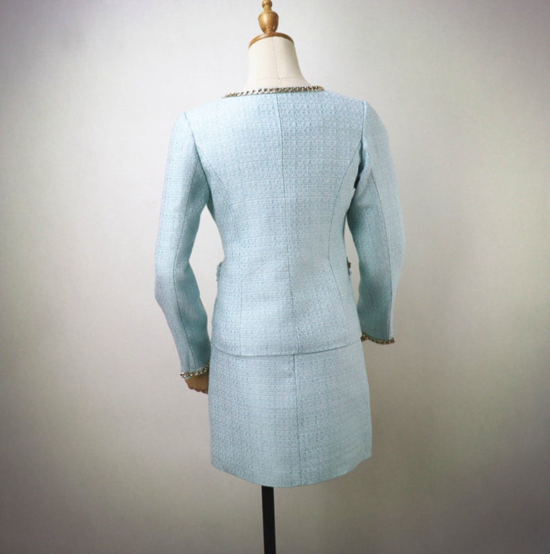 Tailor Made Suits for Women Chain Decoration Tweed Blazer + Skirt Suit - Sky Blue suit and skit with round neck and chain decorated for arm and pocket. We customize everything according to your measurements because we want to make sure your suit fits you perfectly. We create garments that are a perfect fit and deliver it to your door.
