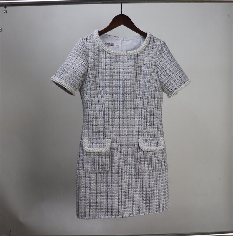 Women's Custom Made Hand Sewn Pearls Fitted Tweed Dress with Pockets UK CUSTOMER SERVICE! Women's Custom Made Hand Sewn Pearls Fitted Tweed Dress with Pockets, can wear it for ceremony, college inauguration, official use and outside. All items are made to order. Please advise your height, weight and body measurements ( Bust, shoulder, Sleeves, Waist and Length etc). Our tailors will make the order for you! Materials: Tweed