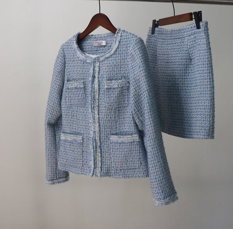 Women's Custom Made Tassel Light Blue Tweed Blazer + Skirt Suit UK CUSTOMER SERVICE! Women's Custom Made Tassel Light Blue Tweed Blazer + Skirt Suit - Custom made suit with front pocket and long sleeves, Our tailor will happy to make exact body measurement , as per customer requirement. All items are made to order. Please advise your height, weight and body measurements ( Bust, shoulder, Sleeves, Waist and Length etc). Our tailors will make the order for you! Materials: Wool blend
