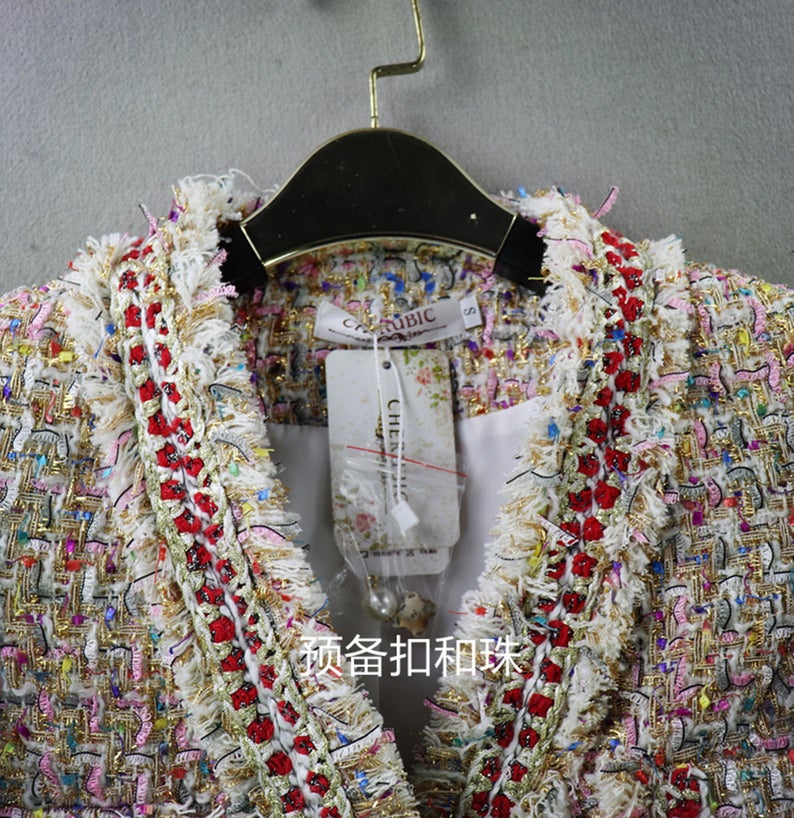 Women's Tassel Pearl Button Tweed Jacket Coat *Customized Size* UK CUSTOMER SERVICE! Women's Tassel Pearl Button Tweed Jacket Coat Blazer - Four front pockets with pearl buttons. Suitable for Winter, outside wear , night wear and autumn season. Casual jacket for women with long sleeves. Jacket fashionable, breathable and comfortable, Can be paired with various bottoms and goes great with skirts, dresses, jeans.