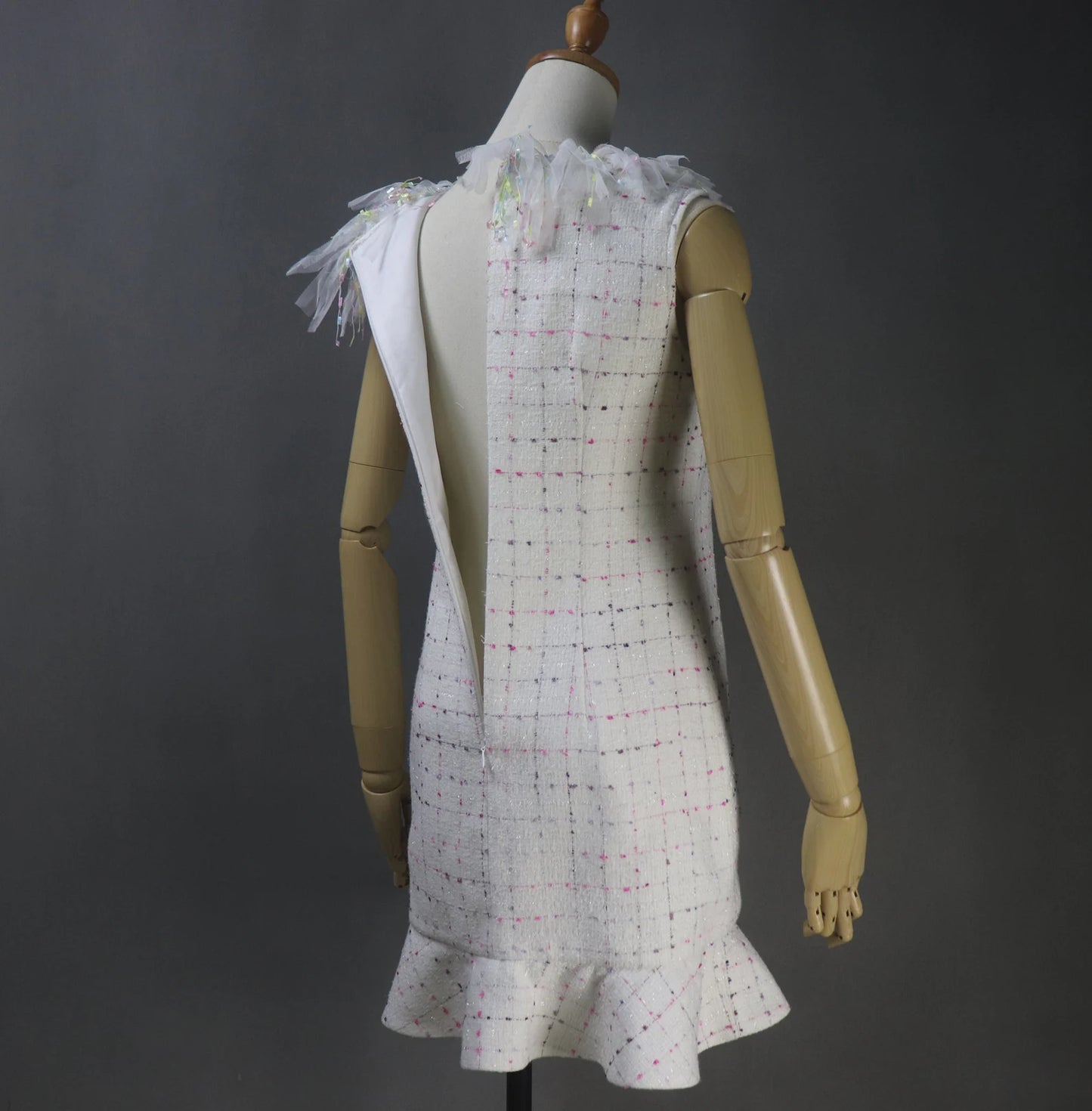 Tailor Custom Made Ruffle Neck / Collar Multi-color Fitted Tweed Mini/ Midi/ Long Ruffle Hem Fishtail Dress, fashion cloth for women made by our tailor. Custom made ruffle with multicolour checked pattern and ruffle design. Fishtail design with sleeveless ,can worn for drama shows, party wear, ceremony. Bespoke women's apparel gives its well-known women's tailoring a delectable feminine twist. All of our products are handcrafted to order.