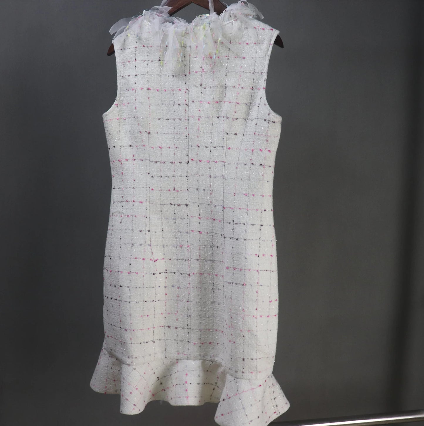 Tailor Custom Made Ruffle Neck / Collar Multi-color Fitted Tweed Mini/ Midi/ Long Ruffle Hem Fishtail Dress, fashion cloth for women made by our tailor. Custom made ruffle with multicolour checked pattern and ruffle design. Fishtail design with sleeveless ,can worn for drama shows, party wear, ceremony. Bespoke women's apparel gives its well-known women's tailoring a delectable feminine twist. All of our products are handcrafted to order.