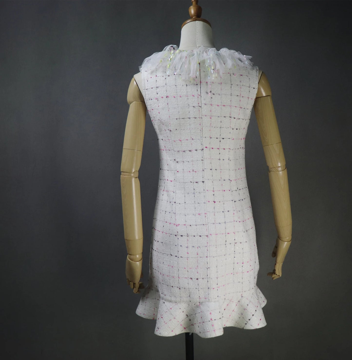 Tailor Custom Made Ruffle Neck / Collar Multi-color Fitted Tweed Mini/ Midi/ Long Ruffle Hem Fishtail Dress, fashion cloth for women made by our tailor. Custom made ruffle with multicolour checked pattern and ruffle design. Fishtail design with sleeveless ,can worn for drama shows, party wear, ceremony. Bespoke women's apparel gives its well-known women's tailoring a delectable feminine twist. All of our products are handcrafted to order.