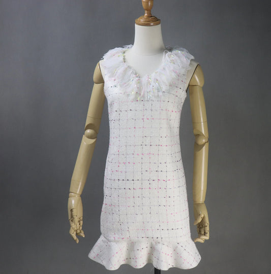 Tailor Custom Made Ruffle Neck / Collar Multi-color Fitted Tweed Mini/ Midi/ Long Ruffle Hem Fishtail Dress, fashion cloth for women made by our tailor. Custom made ruffle with multicolour checked pattern and ruffle design. Fishtail design with sleeveless ,can worn for drama shows, party wear, ceremony. Bespoke women's apparel gives its well-known women's tailoring a delectable feminine twist. All of our products are handcrafted to order.