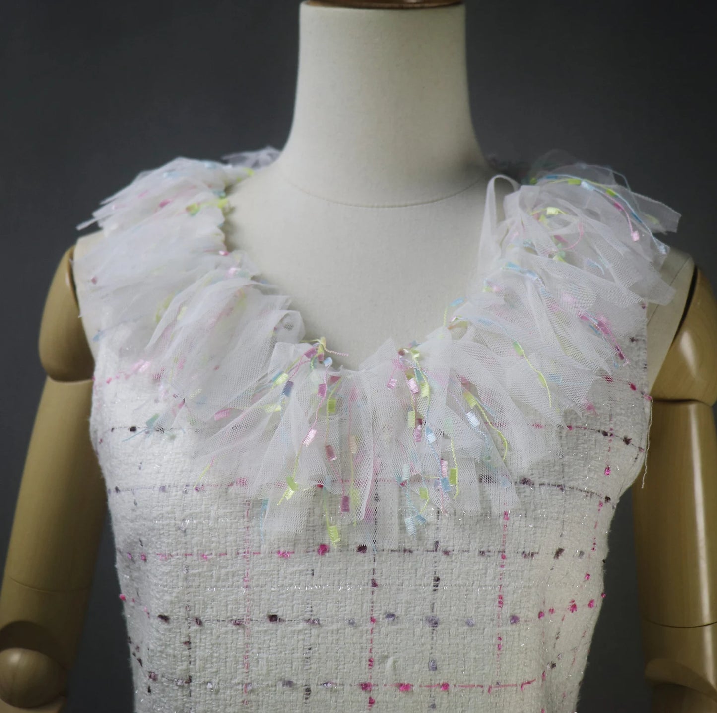 Tailor Custom Made Ruffle Neck / Collar Multi-color Fitted Tweed Mini/ Midi/ Long Ruffle Hem Fishtail Dress, fashion cloth for women made by our tailor. Custom made ruffle with multicolour checked pattern and ruffle design. Fishtail design with sleeveless ,can worn for drama shows, party wear, ceremony. Bespoke women's apparel gives its well-known women's tailoring a delectable feminine twist. All of our products are handcrafted to order.