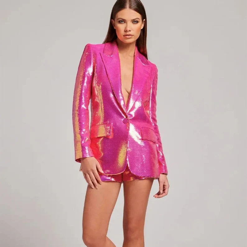 Stylish and daring, the Women's Sequined Shiny Bling Bling Mid-Length Single Breast Blazer + Shorts Suit in Hot Pink is sure to boost your self-esteem.This outfit is perfect for social gatherings like parties and clubs when you want to stand out and wear something daring. Although it is typically inappropriate for formal or business settings, it can be a stylish and fun option for less formal occasions.