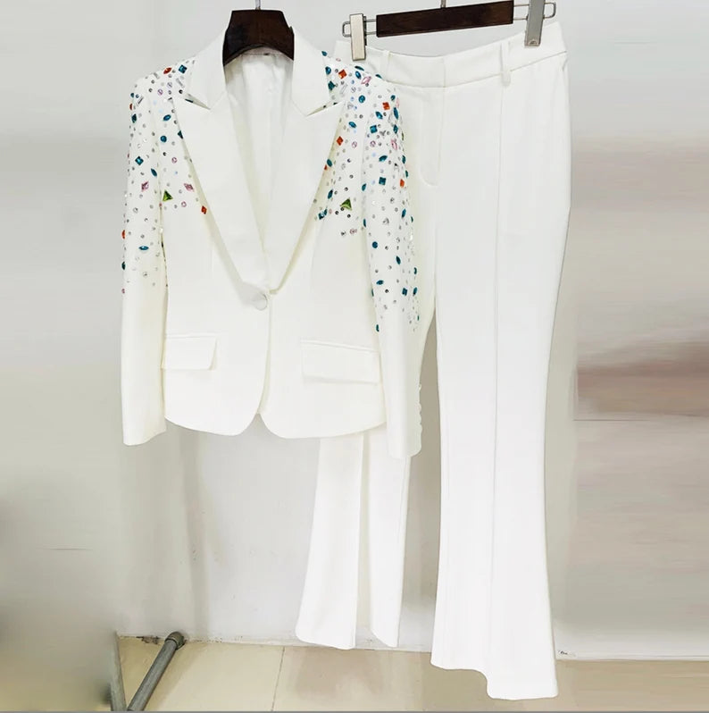 Any occasion is appropriate for this classic women's black hand-made color-stone embroidery blazer + mid-high flare trousers pantsuit suit. This luxurious two-piece ensemble oozes stylish refinement and is sure to leave an impression with its delicate hand-embroidered stones and sleek black blazer. It is the perfect event for both day and nighttime gatherings.