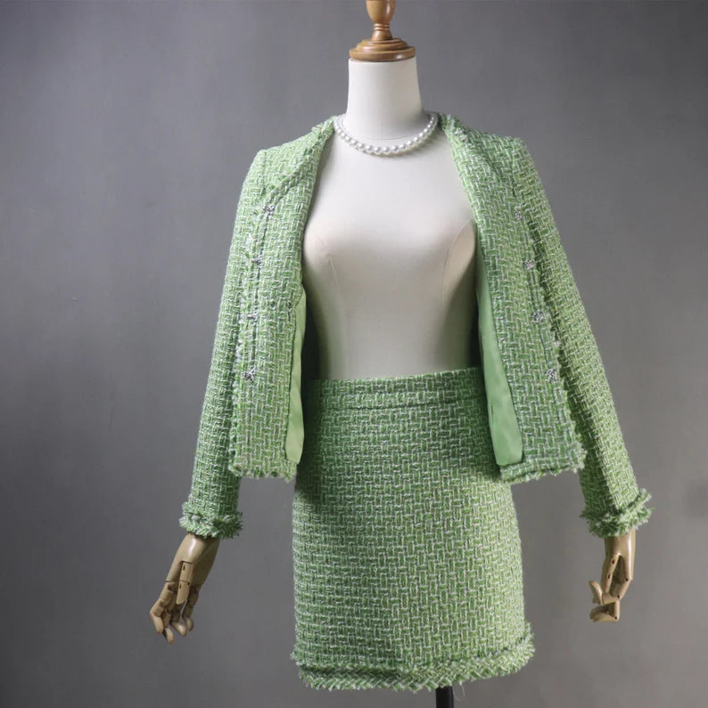 A custom-made light green tweed suit for women is the epitome of personalized style and elegance. Tweed, known for its durability and classic appeal, gets a fresh and feminine update in a light green hue, perfect for adding a touch of sophistication to any wardrobe. 