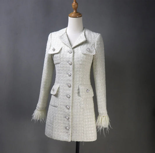 Tailor-made tweed women's clothing with pearl button designs offers a blend of traditional craftsmanship, personalization, and timeless elegance. It's a fashion choice that celebrates individuality and attention to detail, resulting in clothing that is both stylish and comfortable.