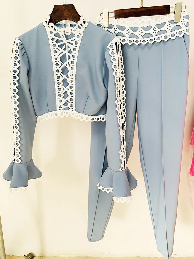 With this women's set of Mid-High Pencil Trousers + Flare Sleeves Crop Top with Openwork Lace Decoration, you can step outside of your comfort zone in chic style. This daring two-piece set comes in White and Blue to elevate any ensemble, making it ideal for big events like weddings and afternoon tea. Take a risk and say something bold!