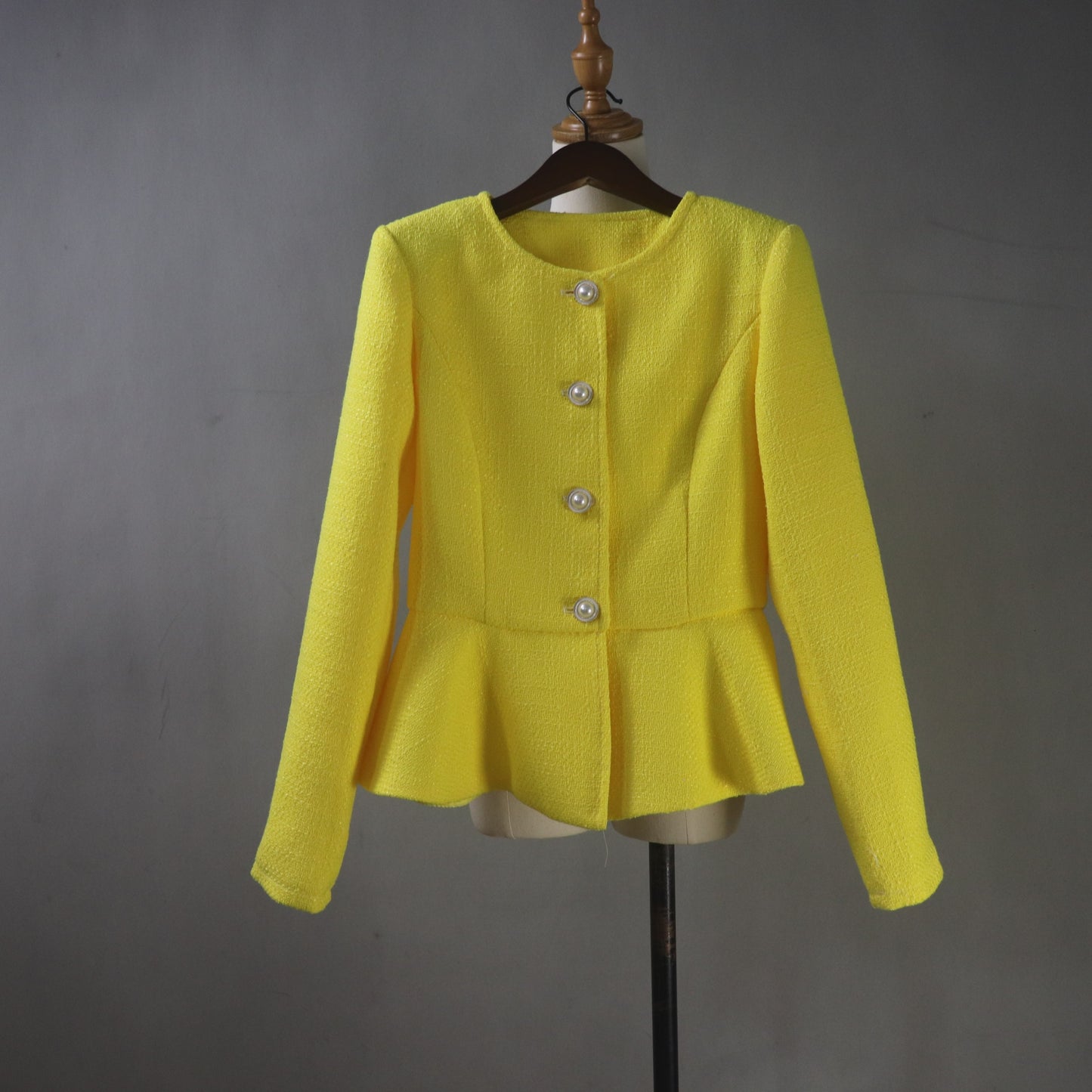 Tailored yellow peplum jacket and skirt set for women, timeless feminine suit with flattering fitted shape