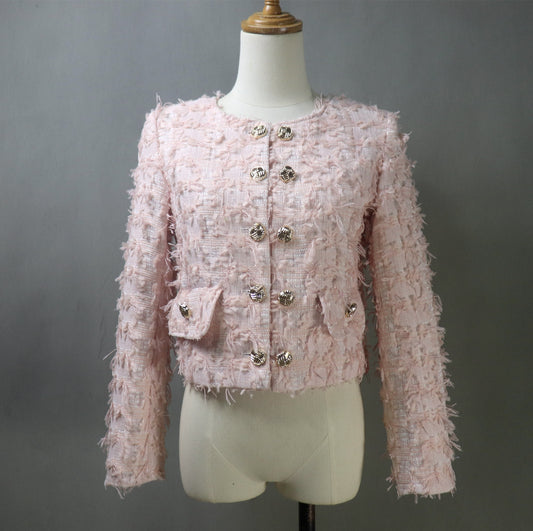 Looking for a versatile yet chic piece that can transition from a classic office look to a standout costume? Our Baby Pink Tweed Jacket is the perfect addition to your wardrobe! Expertly tailored and designed with timeless elegance, this jacket can be styled for various occasions, including: