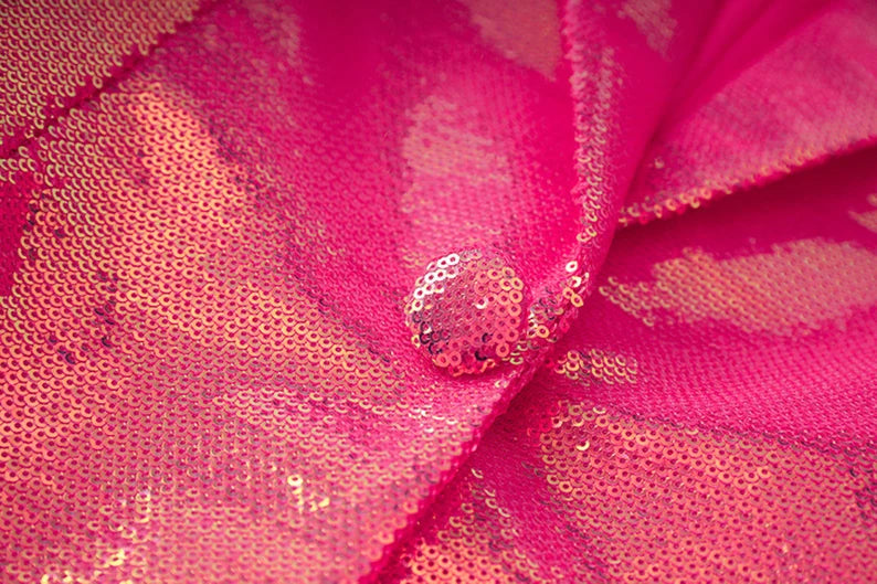 Stylish and daring, the Women's Sequined Shiny Bling Bling Mid-Length Single Breast Blazer + Shorts Suit in Hot Pink is sure to boost your self-esteem.This outfit is perfect for social gatherings like parties and clubs when you want to stand out and wear something daring. Although it is typically inappropriate for formal or business settings, it can be a stylish and fun option for less formal occasions.