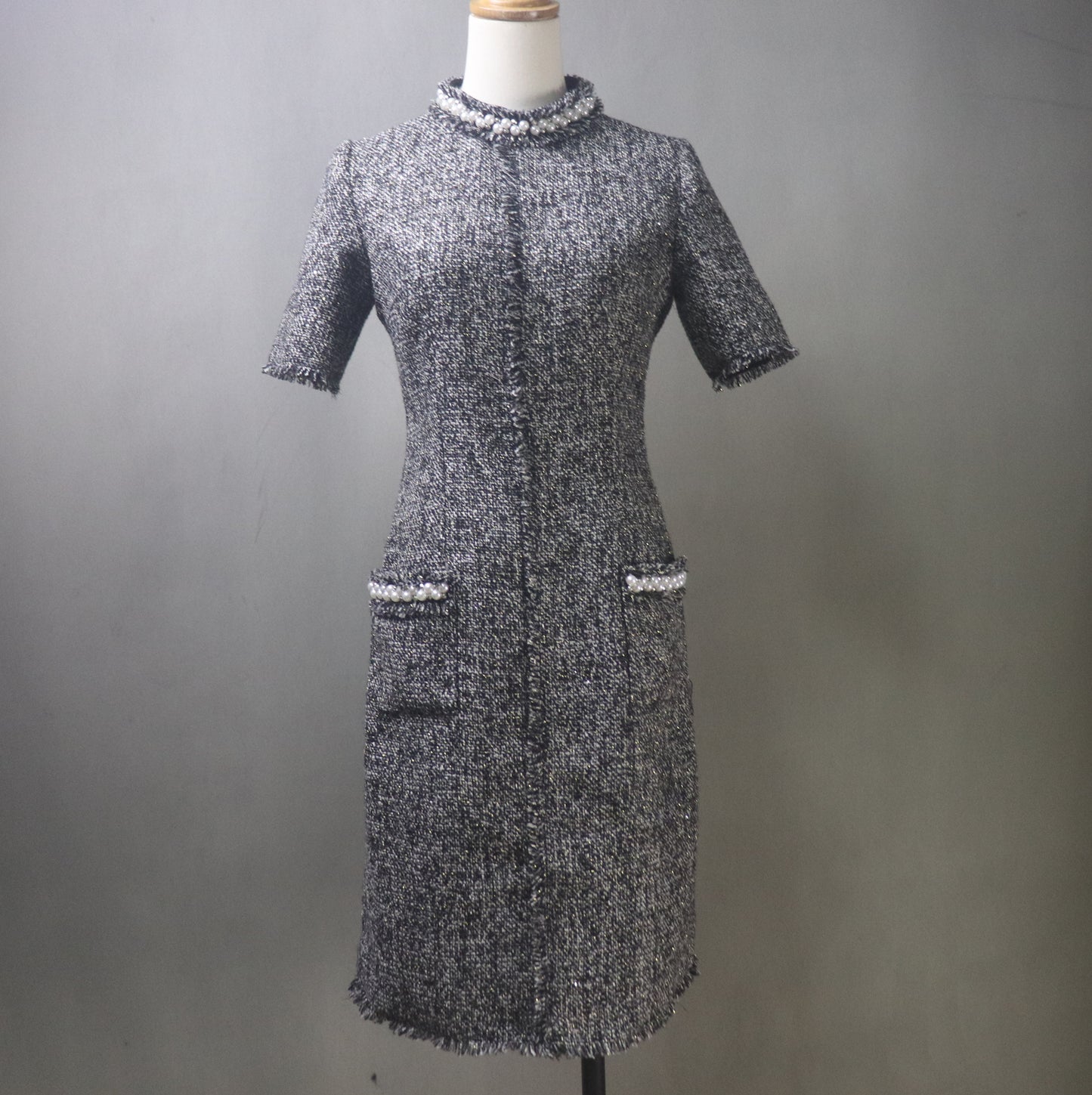 Elevate your wardrobe with this stunning Custom Made Black Tweed Midi Dress, designed to make you feel confident and elegant for any special occasion. Whether you're heading to the office, graduating in style, or attending a formal event, this timeless piece is the perfect choice.