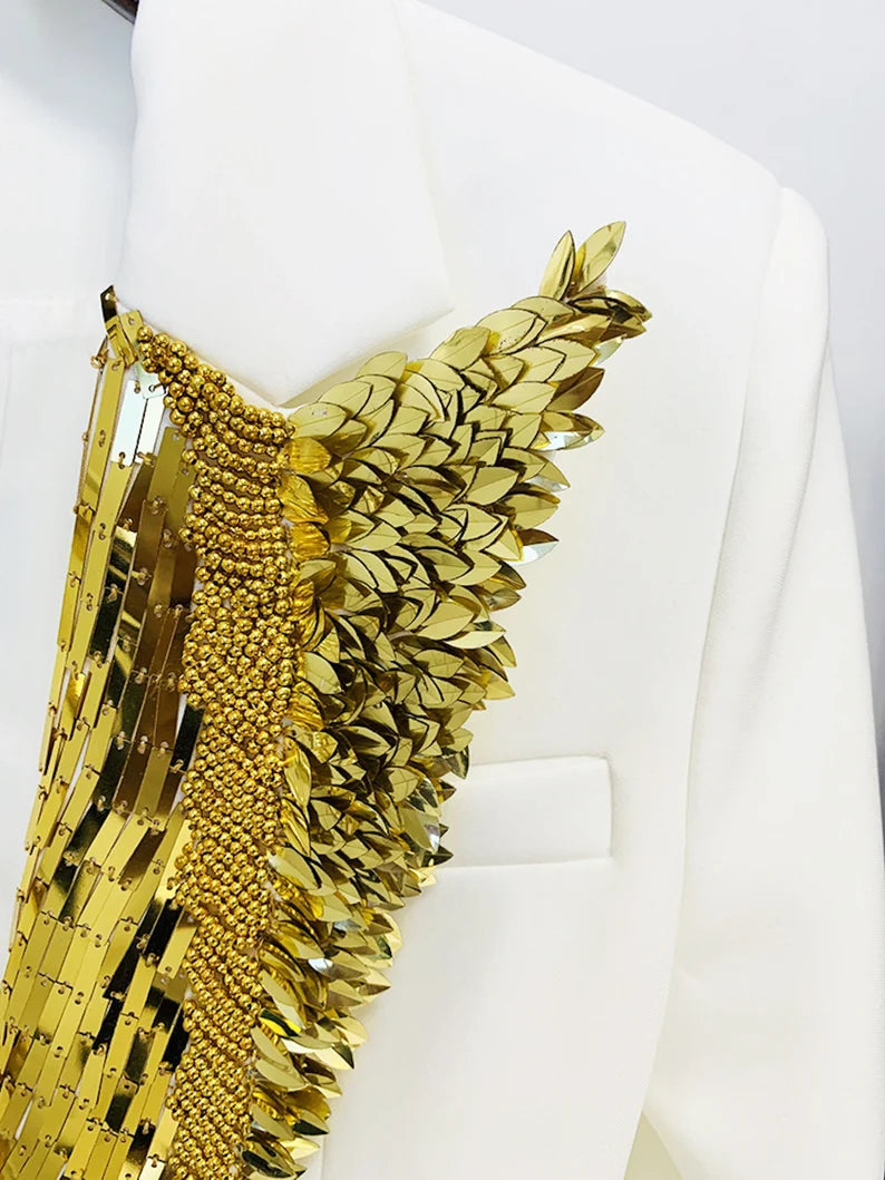 With this gorgeous Women's Luxury Metallic Golden Wings Collar White Blazer, with alluring golden buttons, command attention. For making a statement at your most treasured moments, from speech days and graduation ceremonies to weddings and performance stages, this gorgeous blazer is the epitome of grace and brilliance. Choosing a thoughtful gift This beautiful jacket makes a thoughtful present that honours someone's achievements and reflects their individual flair.