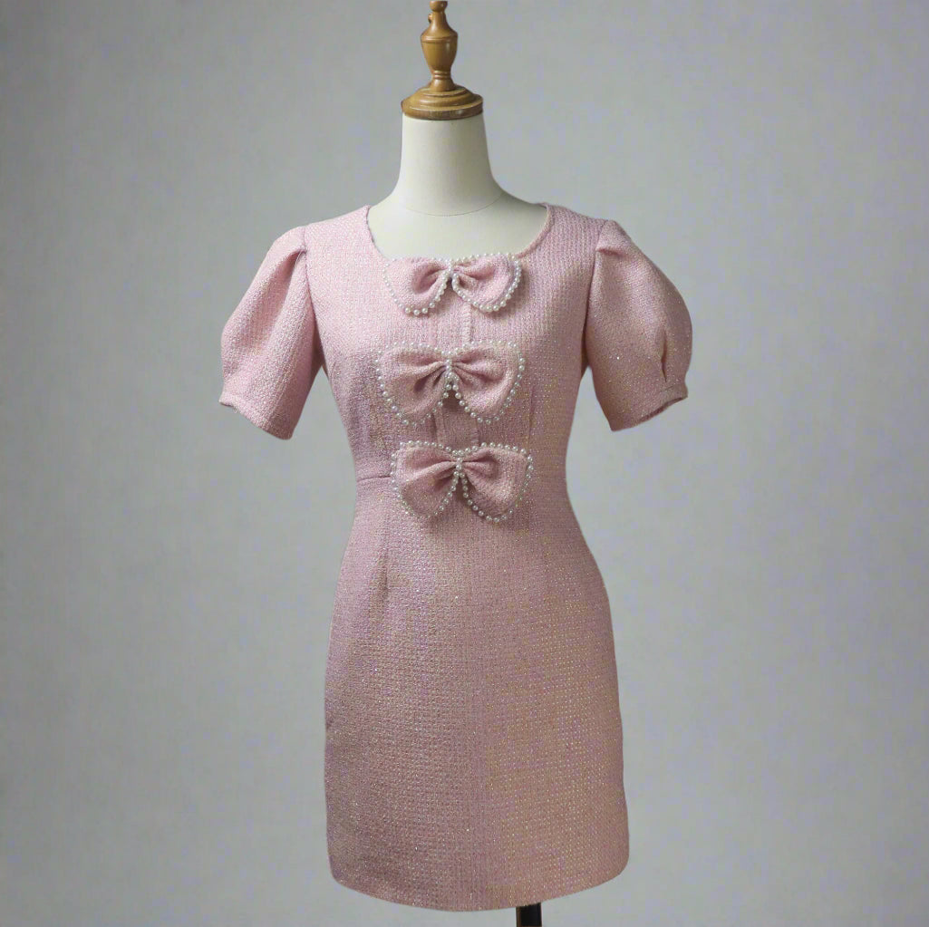 Make a statement at your next special occasion with this custom-made pink tweed dress that combines elegance, charm, and a touch of whimsy. Perfect for bridesmaids, wedding guests, evening dinners, birthday parties, or any event where you want to feel like a princess, this dress is designed to turn heads and make you shine!