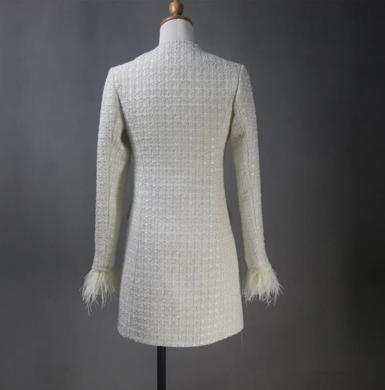 Tailor-made tweed women's clothing with pearl button designs offers a blend of traditional craftsmanship, personalization, and timeless elegance. It's a fashion choice that celebrates individuality and attention to detail, resulting in clothing that is both stylish and comfortable.