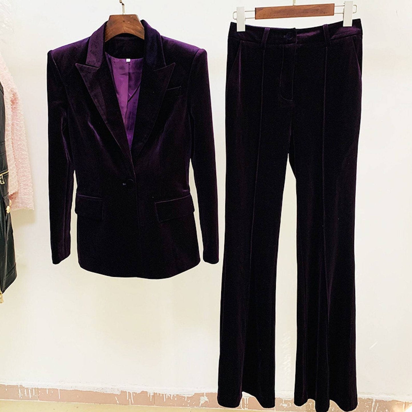 Fashion Pioneer -Purple Velvet Soft, light and stretchy. This blazer deserves a special mention for its stunning fabric alone, as it comes in smooth velvet with a gorgeously soft feel. Ultra chic and bang on-trend, it will take you from day to night with ease. This blazer is so cute and flattering. Paired with a pair of black slacks and a white is perfect for work! Dress it down with a pair of jeans! Very versatile and hits at just the right point. 