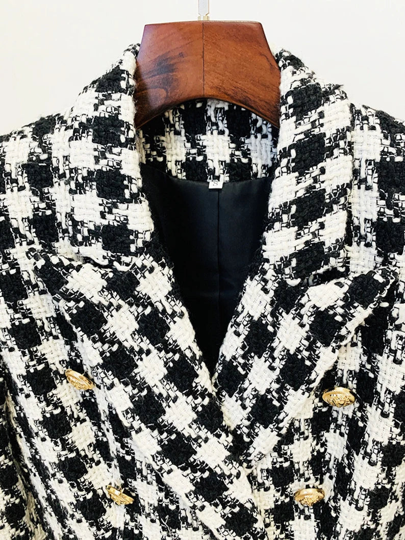 A stunning Black and White Mix Fitted Houndstooth Tweed Jacket Blazer. This jacket has a flawless fit and a smartly tailored double-breasted style with pointed lapels and opulent golden buttons. Excellent for business, formal, casual, and other special occasions. This suit blazer makes you seem gorgeous whether you're going for a casual or business look. This blazer fits your chest and waist well, and it looks amazing with your favourite leggings or boots.