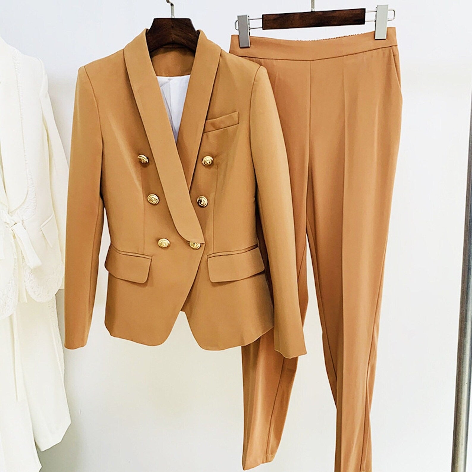 Tan Shawl Collar Golden Buttons Blazer + Crop Trousers Suit Quick International Service!  Tan Shawl Collar Golden Buttons Blazer + Crop Trousers Suit , can wear it for College Inaugurations, Ceremony , Business use, Onsite and Official use. The comfort of our ladies tailored suits are unsurpassed, as is the confidence it can provide its wearer in knowing that they are looking at their absolute best.
