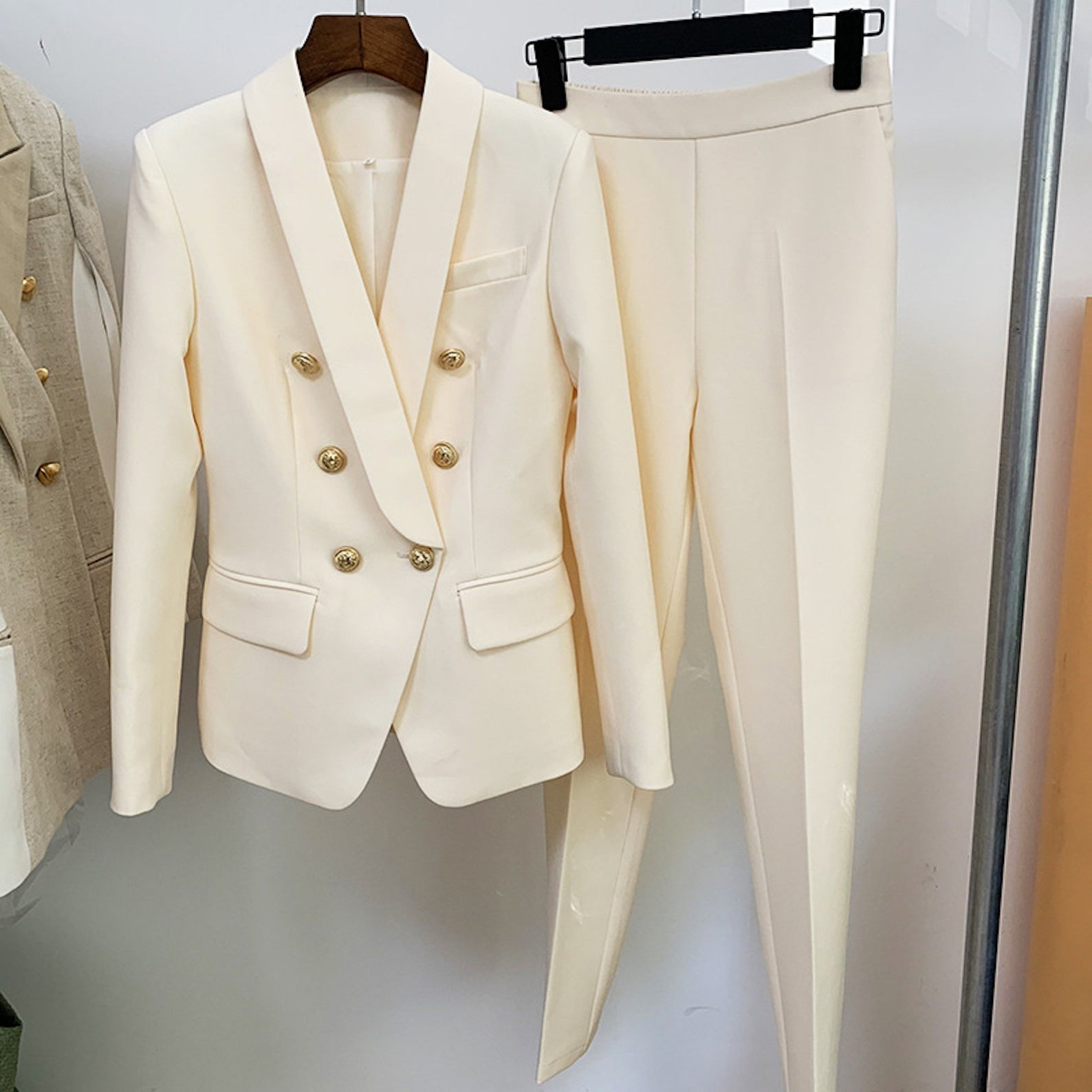 White Blazer Shawl Collar Golden Buttons + Crop Trousers Suit 3 for Women Quick International Service!  Blazer Shawl Collar Golden Buttons + Crop Trousers Suit 3 Colours, can wear it for College Inaugurations, Ceremony and Official use. The comfort of our ladies tailored suits are unsurpassed, as is the confidence it can provide its wearer in knowing that they are looking at their absolute best.