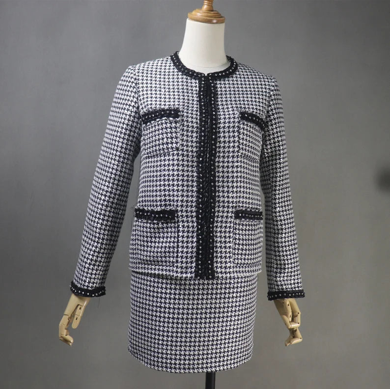 Tailor Made Houndstooth Check Pattern Jewellery Trim Tweed Jacket Coat Blazer + Shorts/Skirts/Trousers  There are many different materials to pick from when purchasing one of our ladies tailored coats, including light and heavy weight tweeds. As with all of our clothing, we recognise that each person's personal landscape is unique, thus our skilled tailor's advice is essential to guaranteeing the size and figuration are ideal.