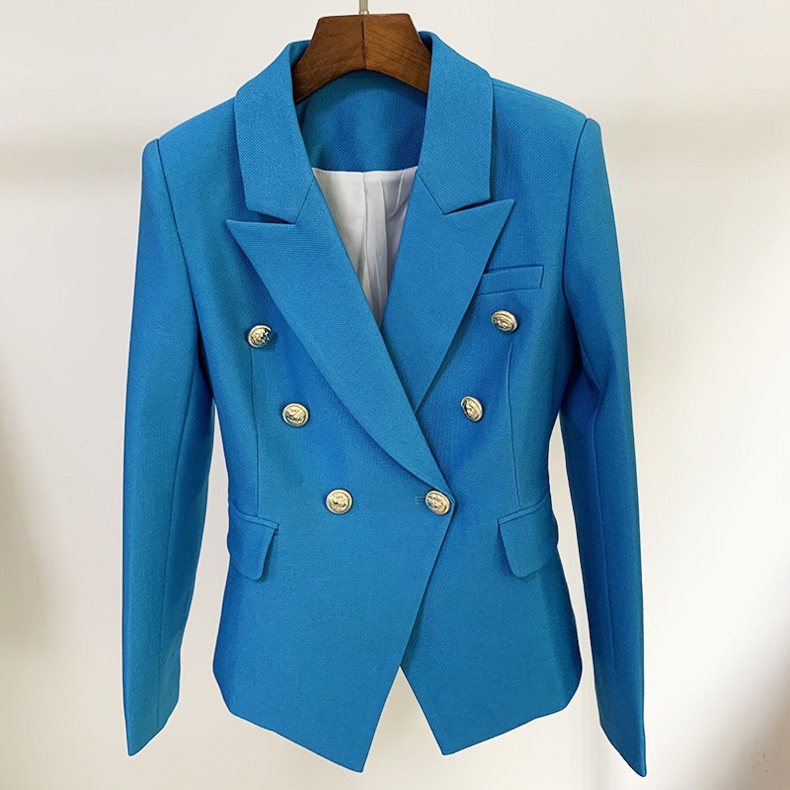 Women's Fitted Blazer Golden Lion Buttons Coat Blue UK CUSTOMER SERVICE! Women's Fitted Blazer Golden Lion Buttons Coat Blue- can worn for business meeting, daily wear, formal date, office work, vacation and outdoor activities. Classic fashion design, the simple and comfort can accentuate the neck line.  Polyester Fastening: Button Slim Long Sleeve